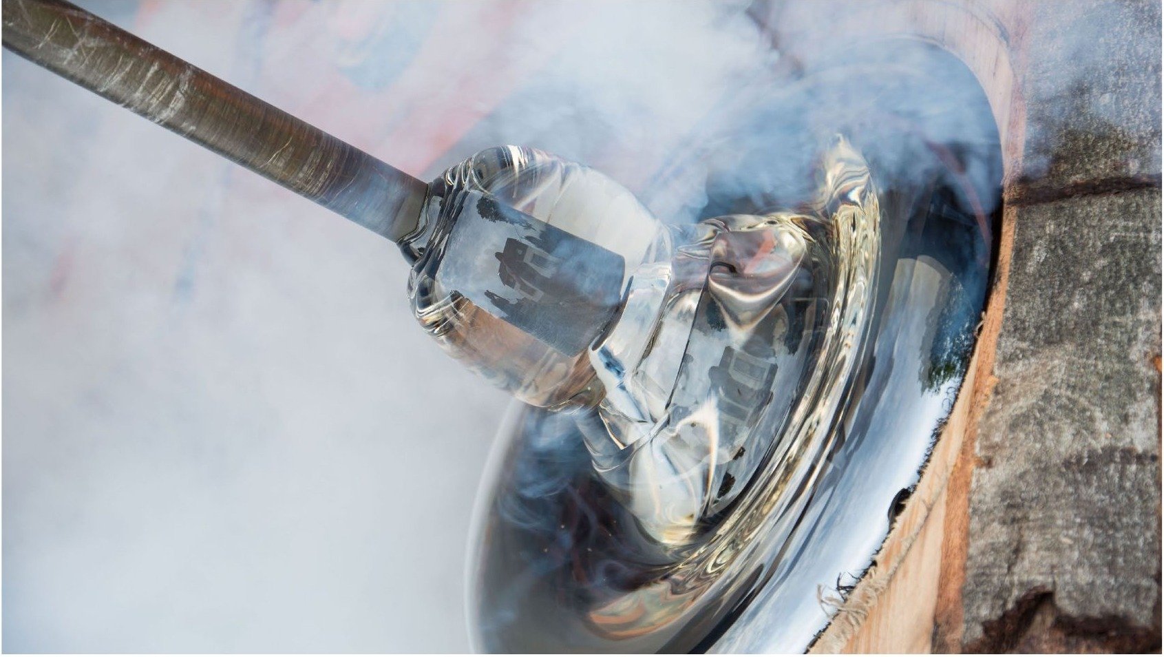 Glass being shaped by hand